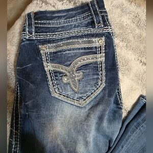 Rock Revival Blue Boot Cut Jeans with Intricate Stitching